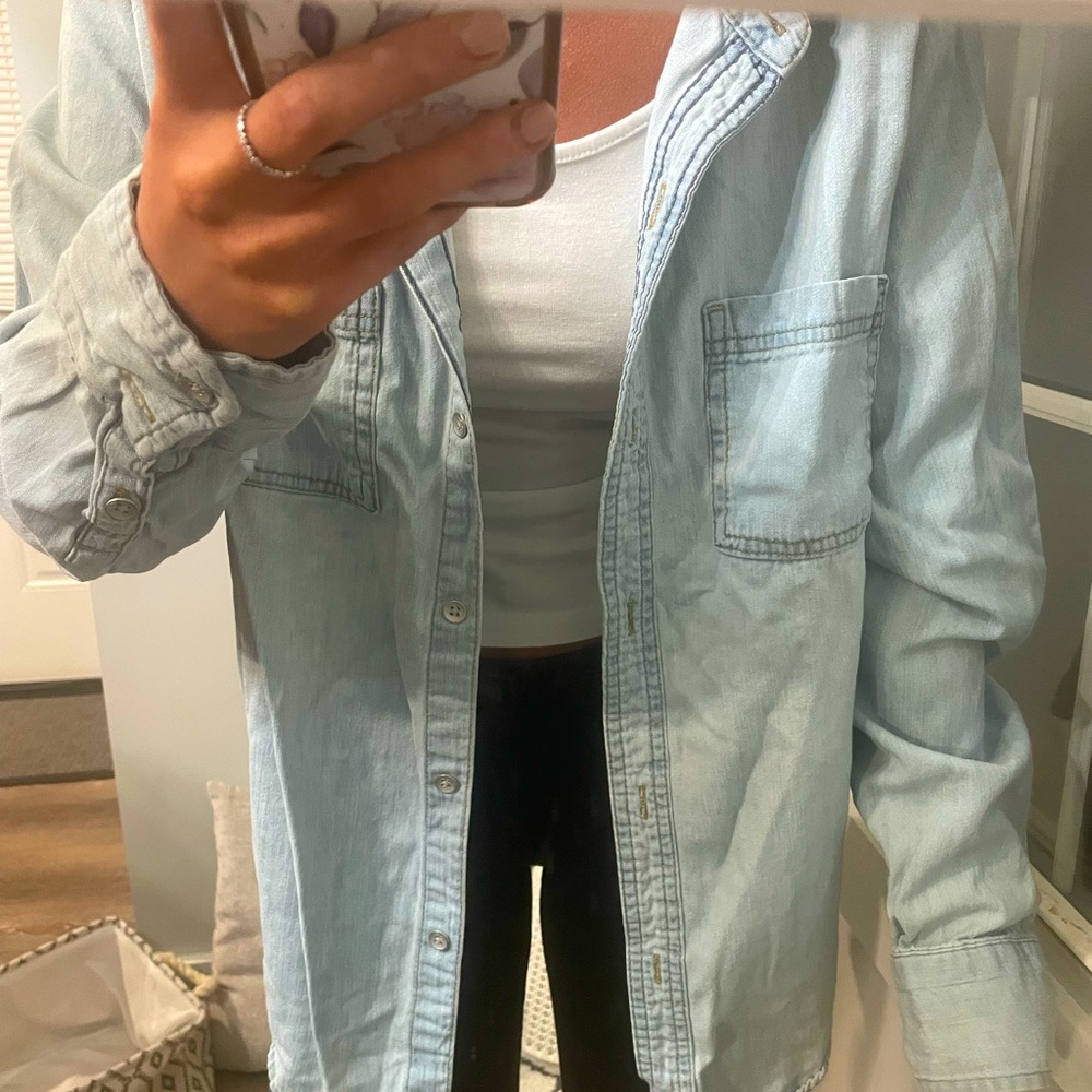 Lightweight jean type jacket. Button up.